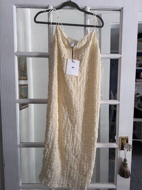Yllw the Label butter cream Textured Slip Dress with tie Spaghetti Straps